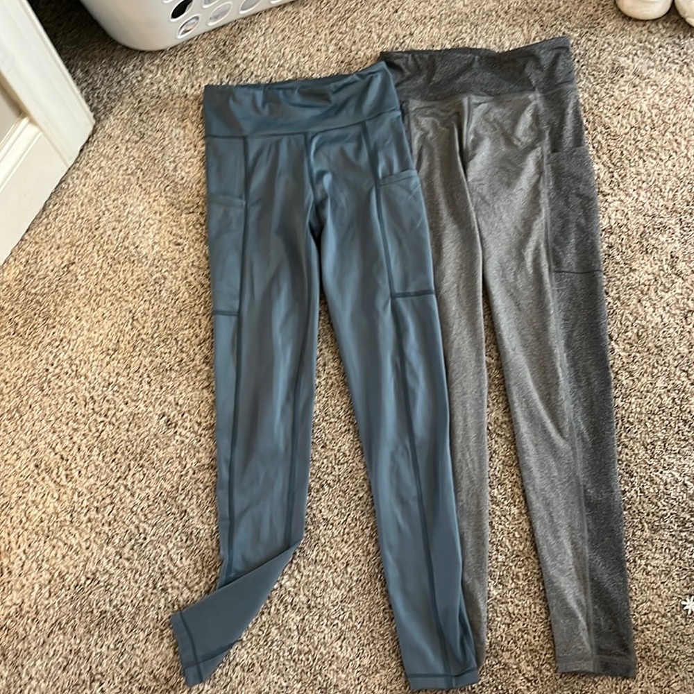Two pairs of air Postel leggings